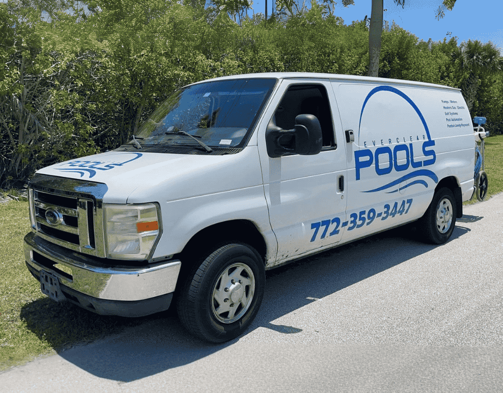 Professional pool technician servicing a commercial pool near me