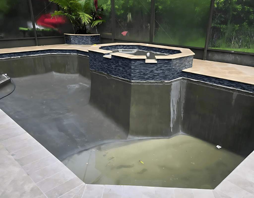 Custom tile and coping upgrade during pool remodel by Pools USA in Port St. Lucie, FL