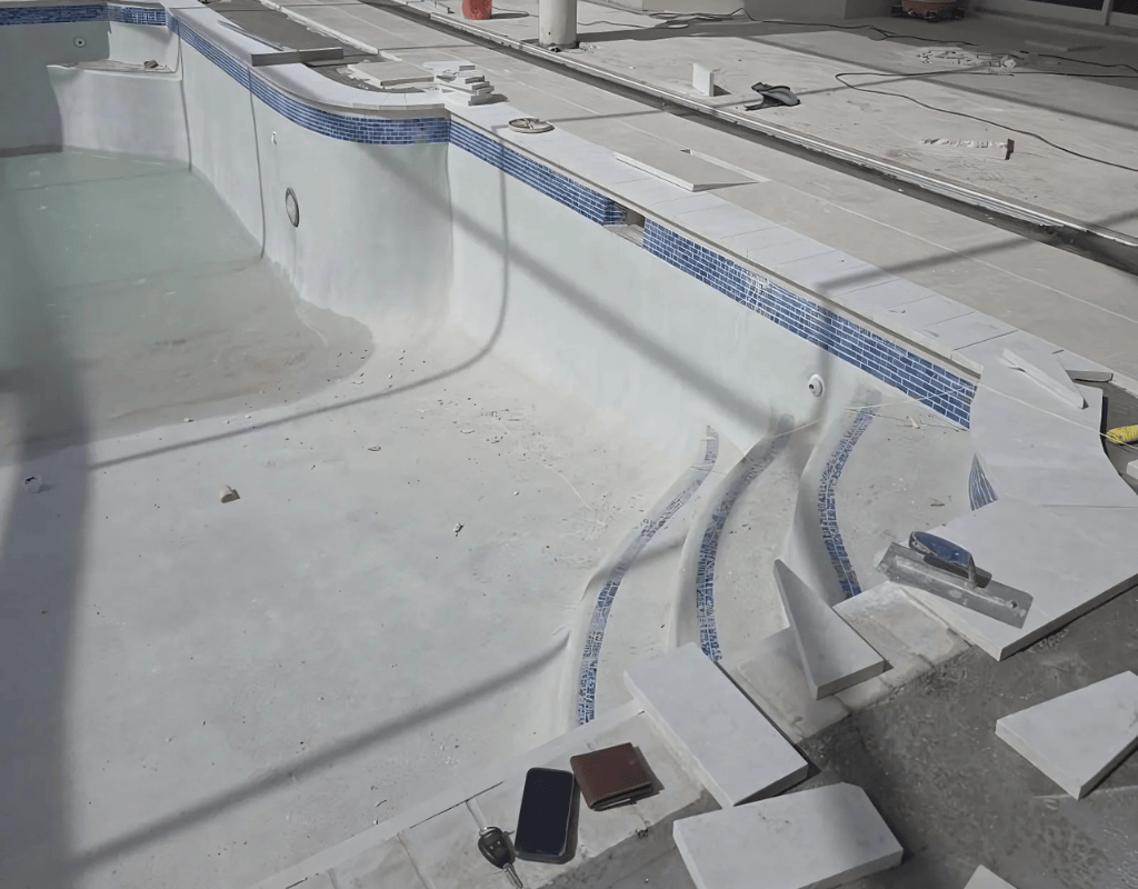 Stuart pool restoration project with tiled finish